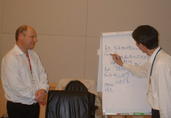 Participant writing on flipchart